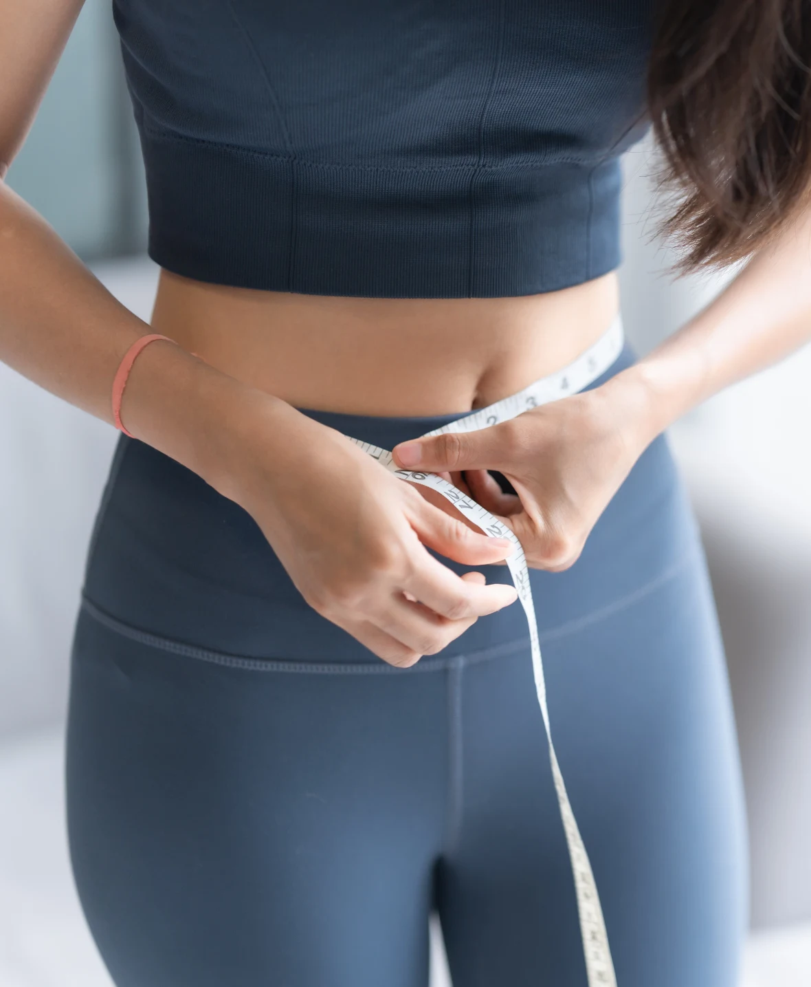 Understanding causes of flat buttocks like genetic body shape and asymmetry at London Harley Street Clinics