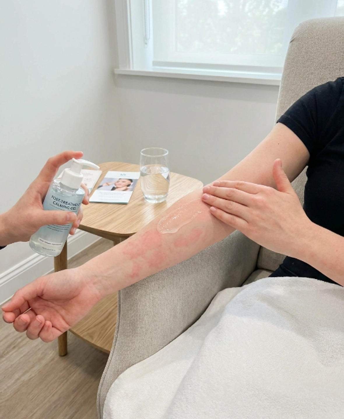 Patient caring for skin after laser hair removal treatment with mild temporary redness visible